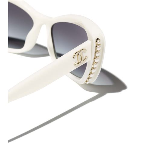 chanel sunglasses white logo|chanel sunglasses logo on side.